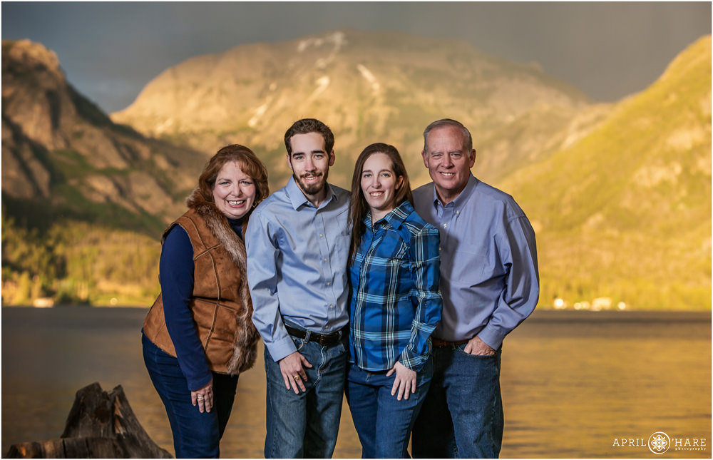 Beautiful sunset family photo with mountain backdrop at Point Park in Colorado