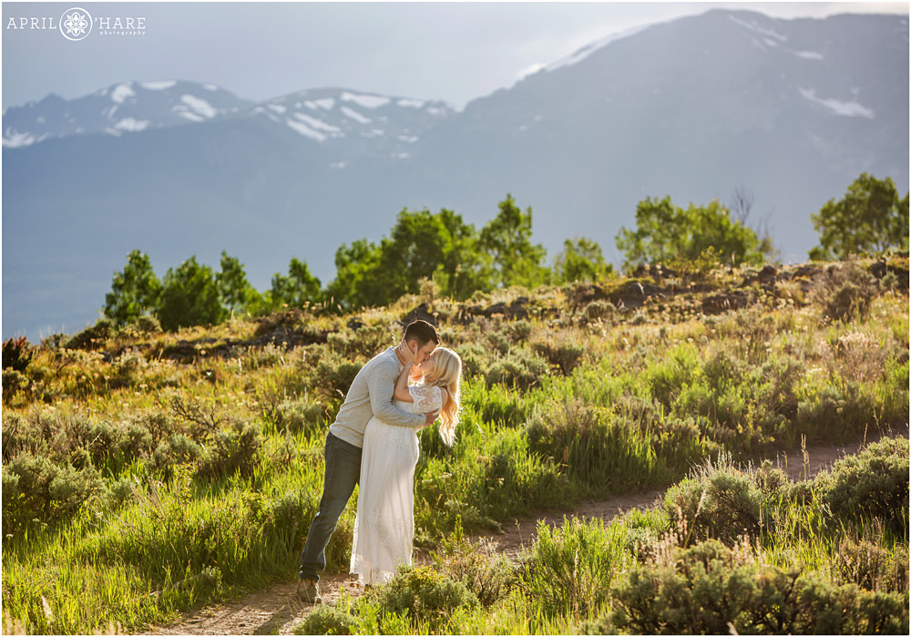 Romantic maternity photo on a Colorado trail on a summer day in Summit County