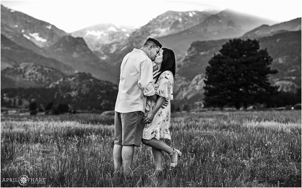 A pretty B&W photo of a couple kissing during their Colorado engagement photography session at Rocky Mountain National Park