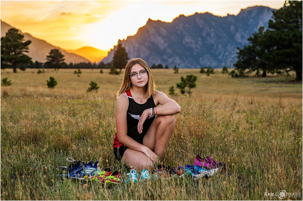 Awesome high school senior cross country athlete runner photo with mountain backdrop