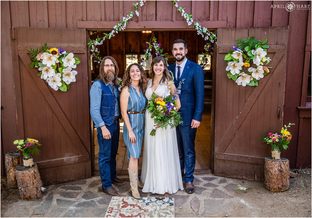 Classic portraits created with friends in front of a rustic private barn in Colorado