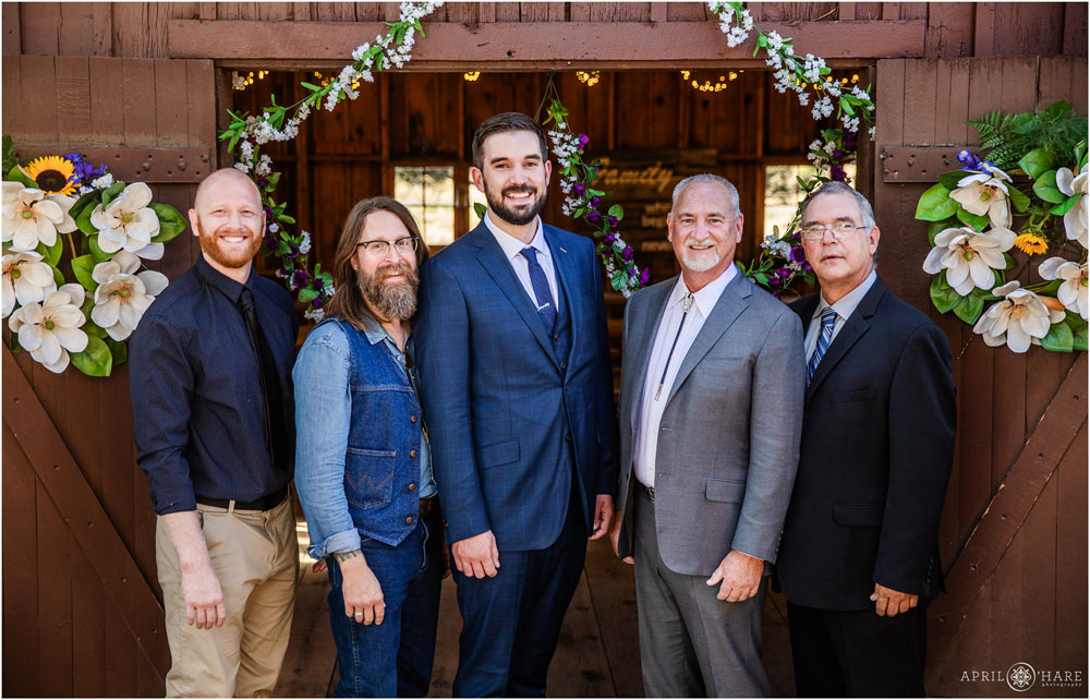 Groom with all of the guys at his small wedding in Colorado