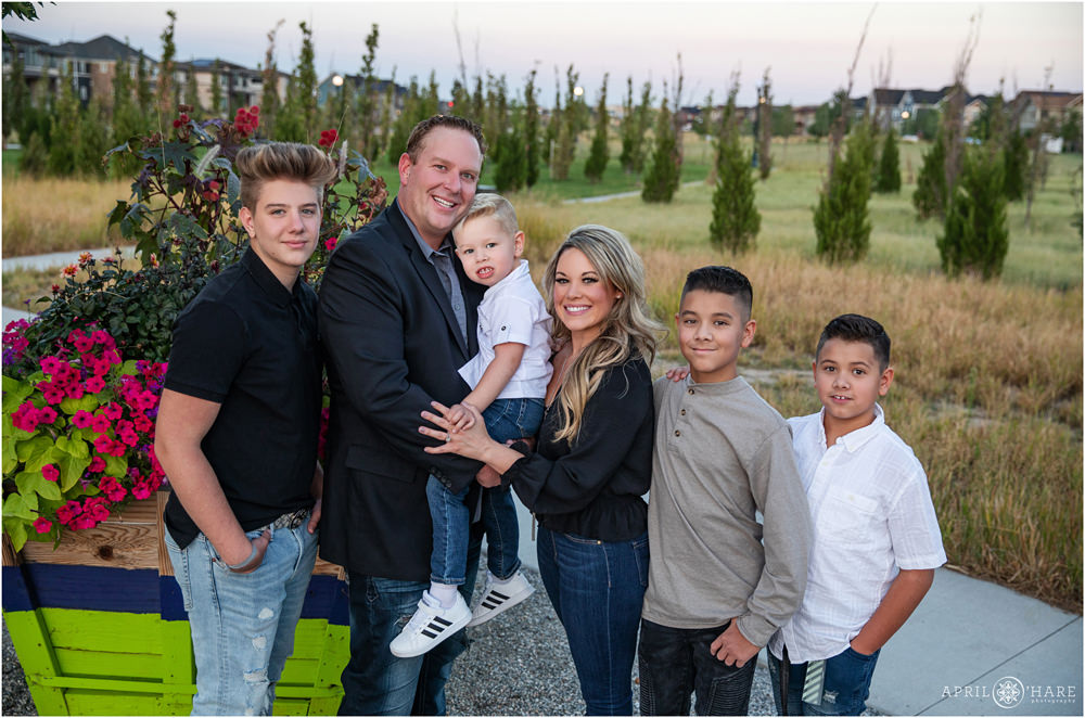 A blended family of 6 with 4 sons at Prairie Meadows Park in Denver Colorado