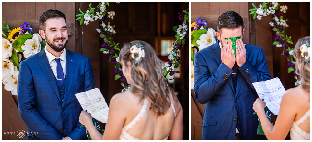 Emotional wedding day with groom wiping tears with handkerchief as bride reads her vows in Colorado