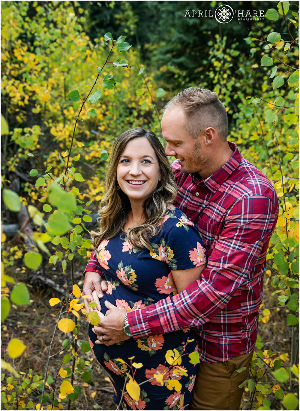Maternity photo in the fall color on Squaw Pass Road in Evergreen Colorado