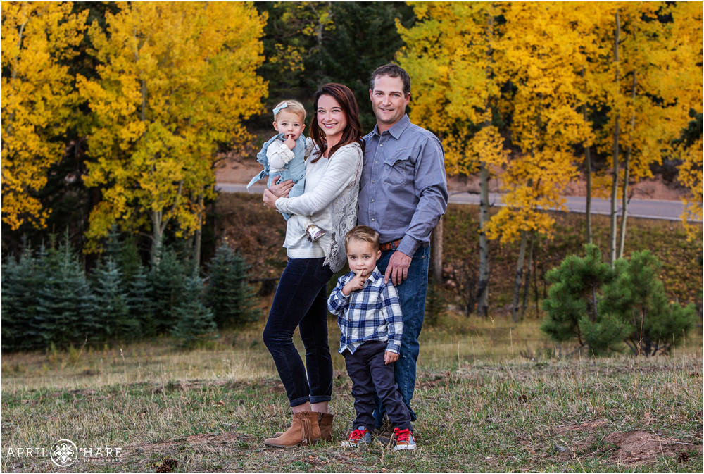 Cute Family Portrait in front of the Fall Color Aspen Trees in Conifer CO
