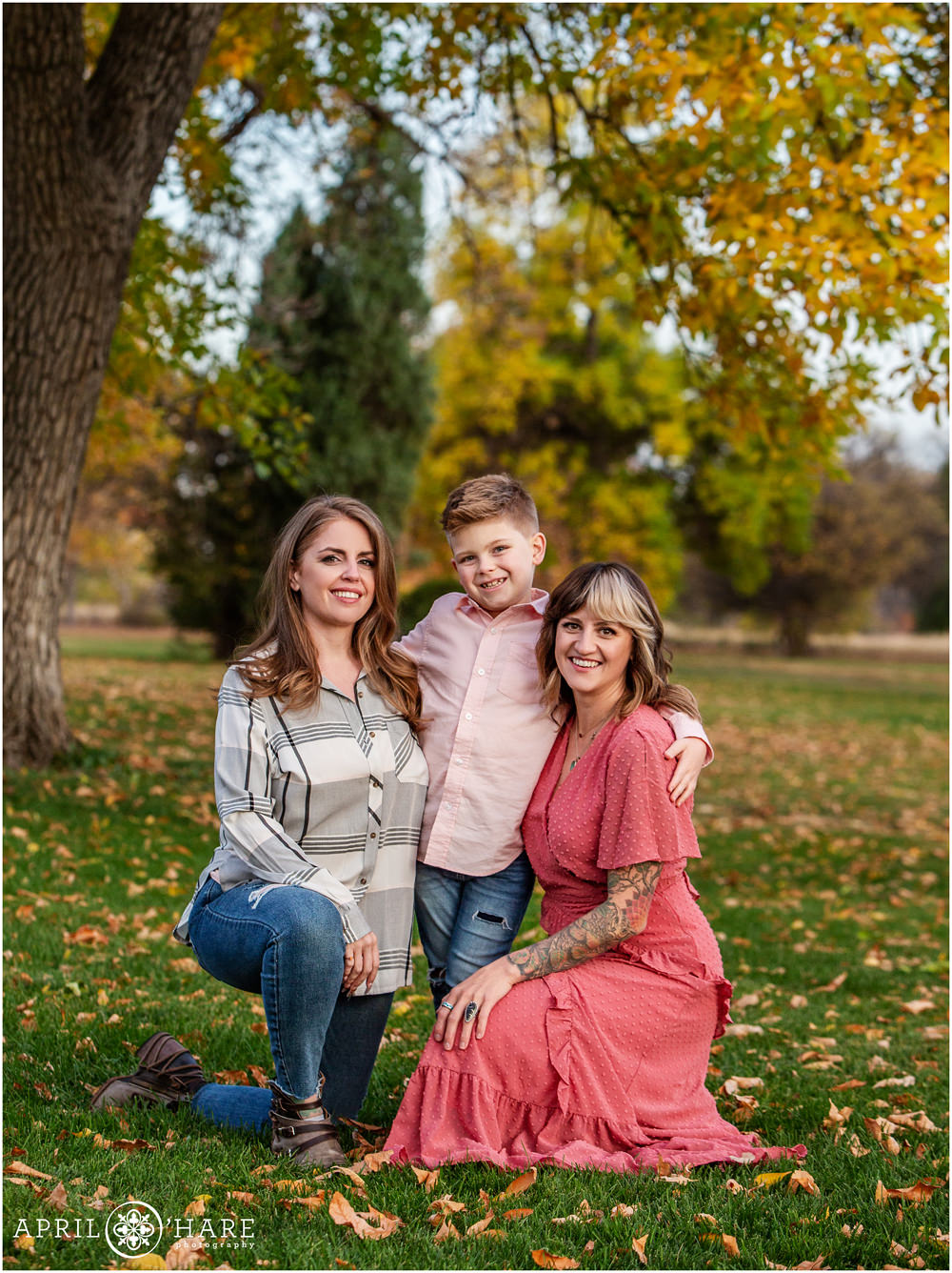 Family photo in the fall color at City Park in Denver Colorado