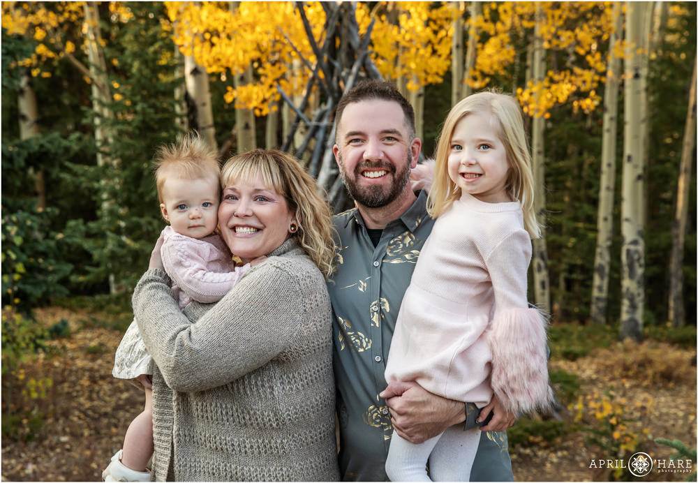 Pretty fall color portraits on Squaw Pass Road for a family of 4 with two young girls