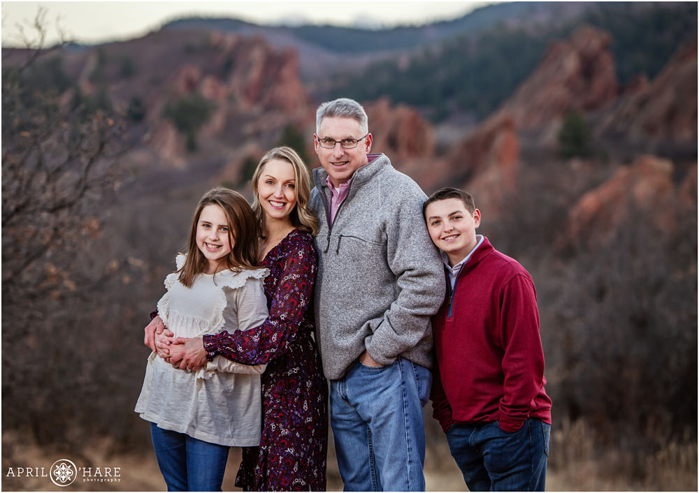 Beautiful family portrait for a family of four at Roxborough State Park in Colorado