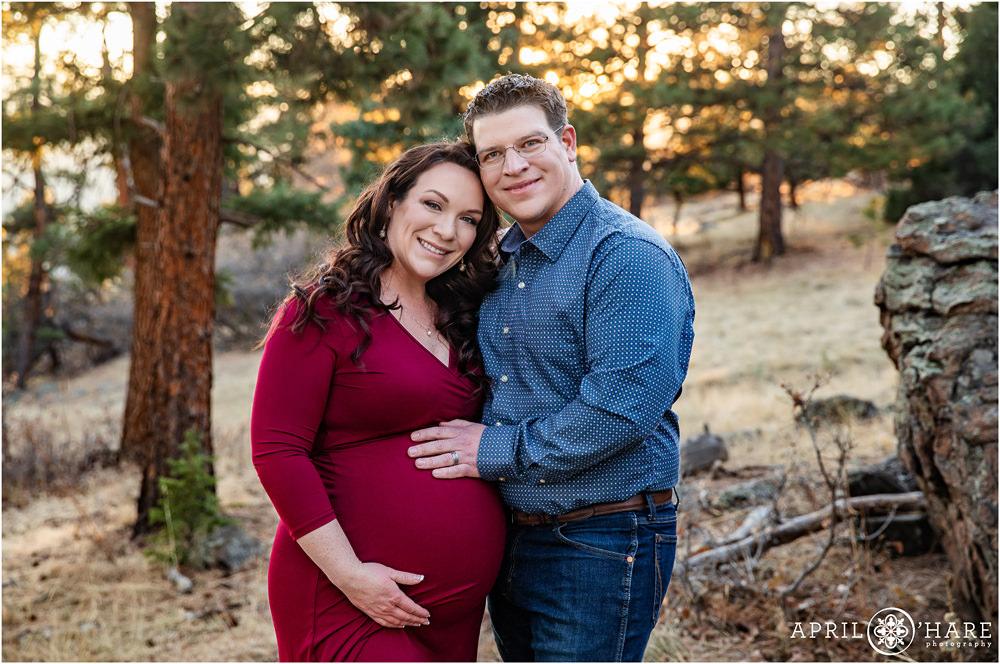 Pretty mountain maternity photography session for parents to be at West Mount Falcon in Colorado