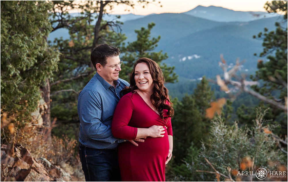 Beautiful maternity portrait of a married couple with mountain backdrop at West Mount Falcon