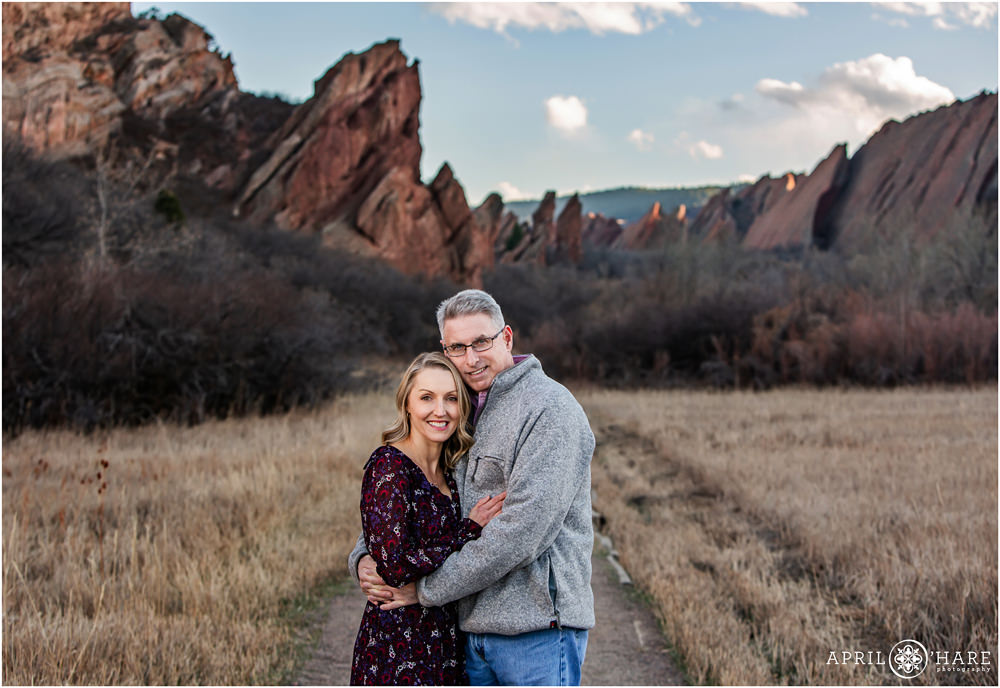 Mom and dad get their own couples photo together at their family photography session at Roxborough State Park in Colorado