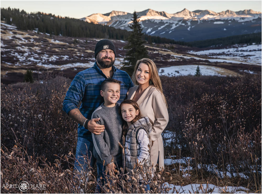 Cute family photo on Shrine Pass with Copper Mountain in the backdrop near Vail