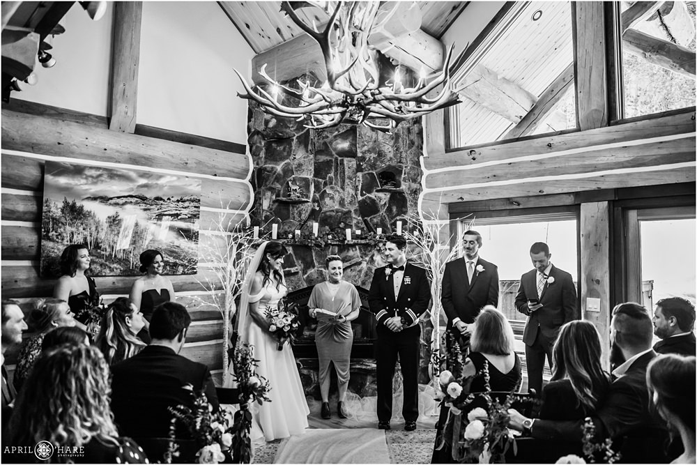 Beautiful B&W wedding photo of indoor wedding ceremony at a private home in Keystone Colorado