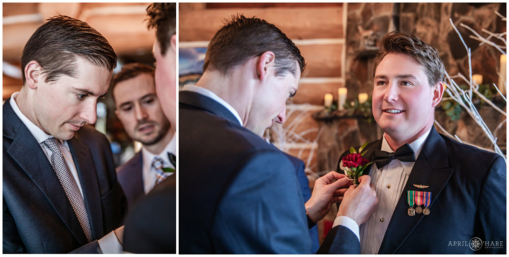 Groom gets help with his boutonniere at his private home wedding in Keystone Colorado