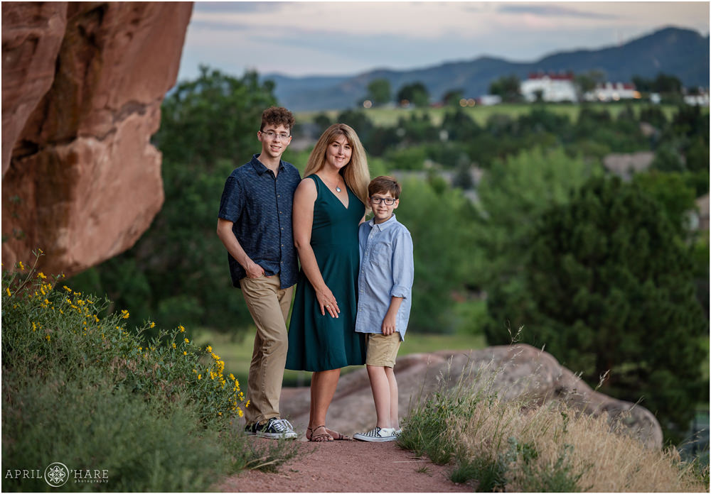 Ken Caryl Family Photos with Manor House Backdrop and wildflowers and red rock formations in the environment too