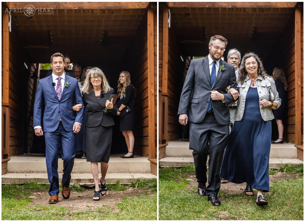 Groom walks down aisle while brother walks mom down aisle at outdoor wedding at Estes Park Condos