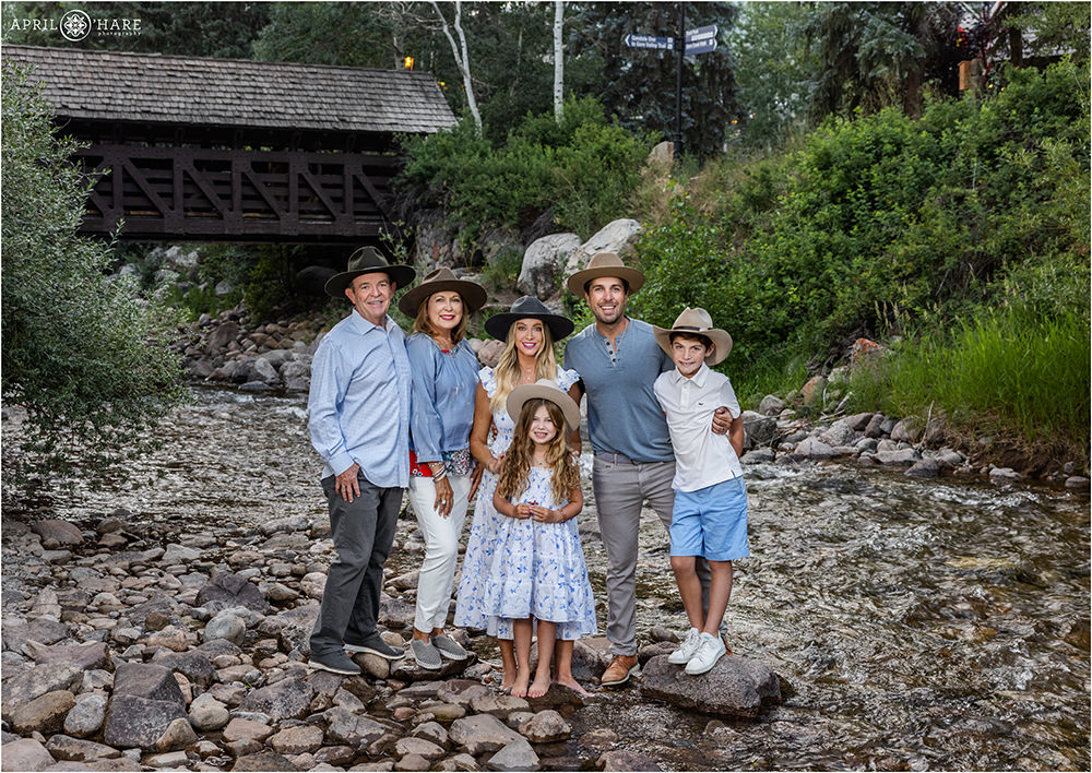 Gore Creek Family Photos during summer with a family all wearing Kemo Sabe western hats in Vail Colorado