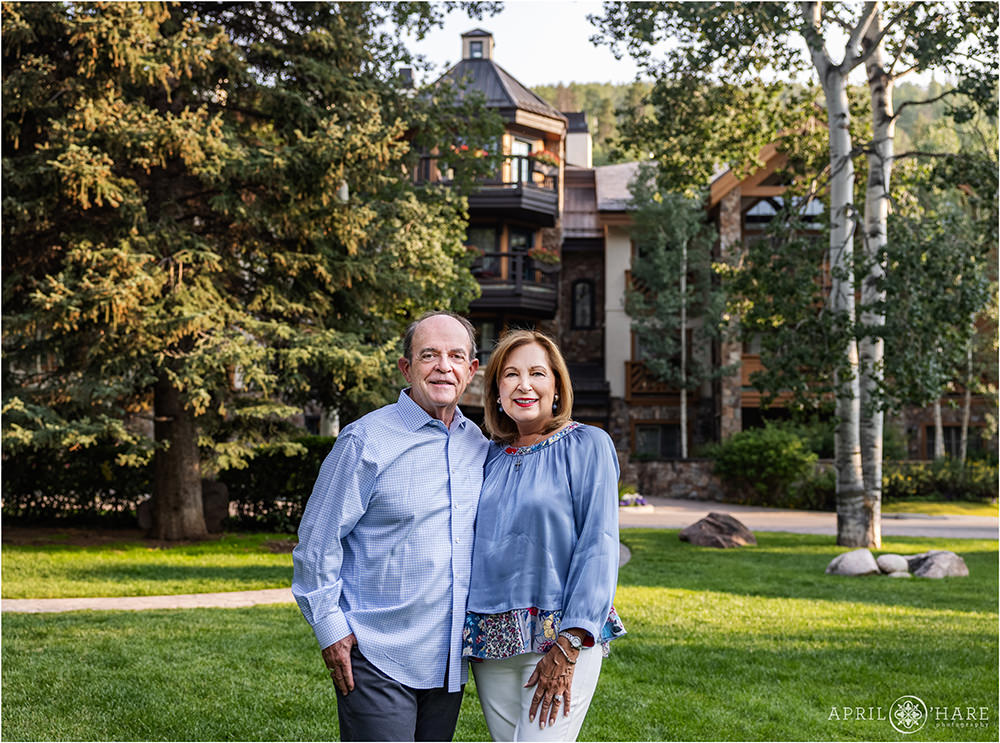 Couple pose in front of the Willows Condos in Vail Colorado
