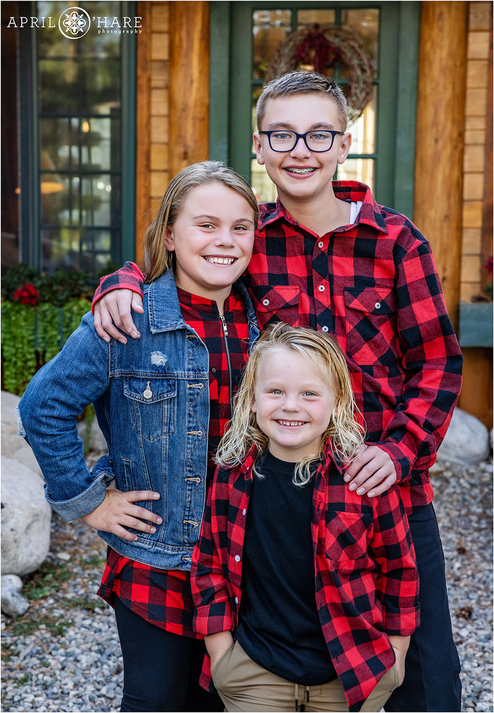 Cousins pose for photos at a Colorado mountain home in Grand Lake