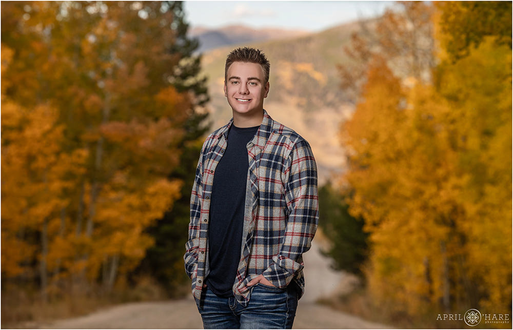 Meadow Creek Trailhead with Fall Color for Senior photos on a dirt road in Frisco Colorado