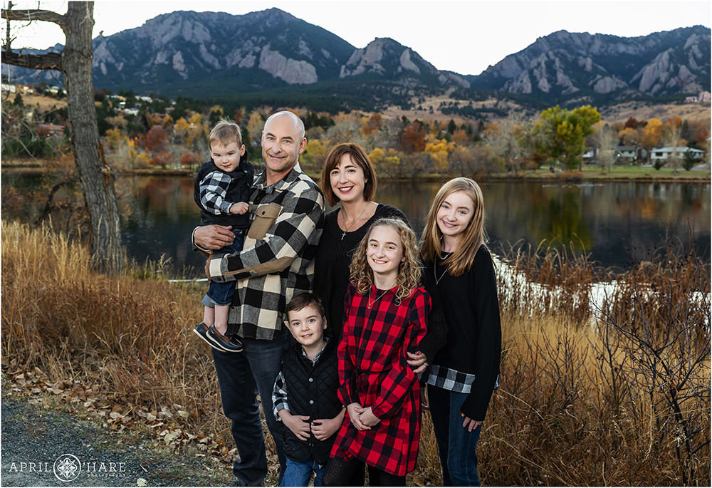 Pretty fall photo for a family with 4 kids in front of Viele Lake in Boulder Colorado