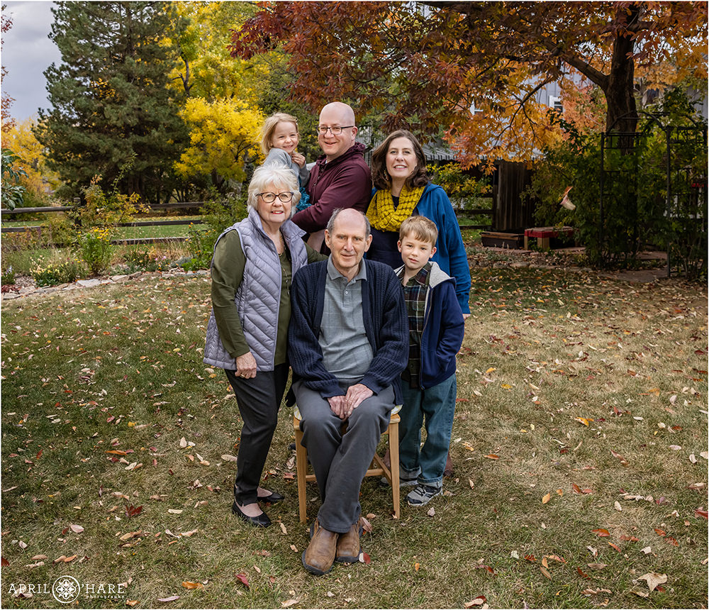 Grandparents with their family in the backyard in Denver