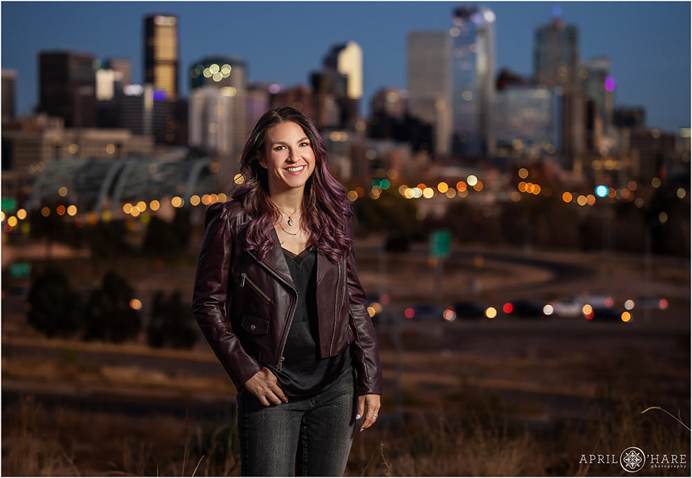 Gorgeous Denver skyline professional business portrait with fun flair for a woman with purple hair