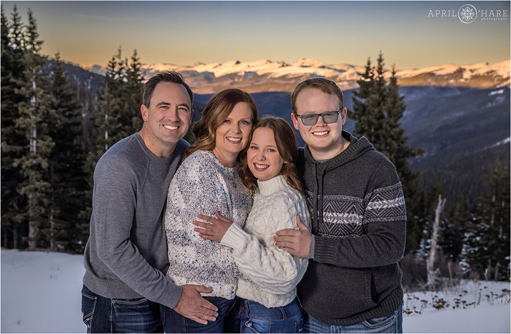 Gorgeous mountain backdrop at Sunset for a family portrait at Berthoud Pass near Winter Park