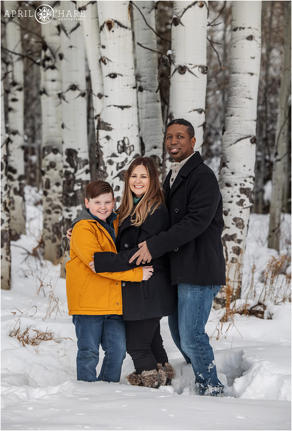 Beaver Creek Family portrait with a pretty aspen tree trunk backdrop in Colorado