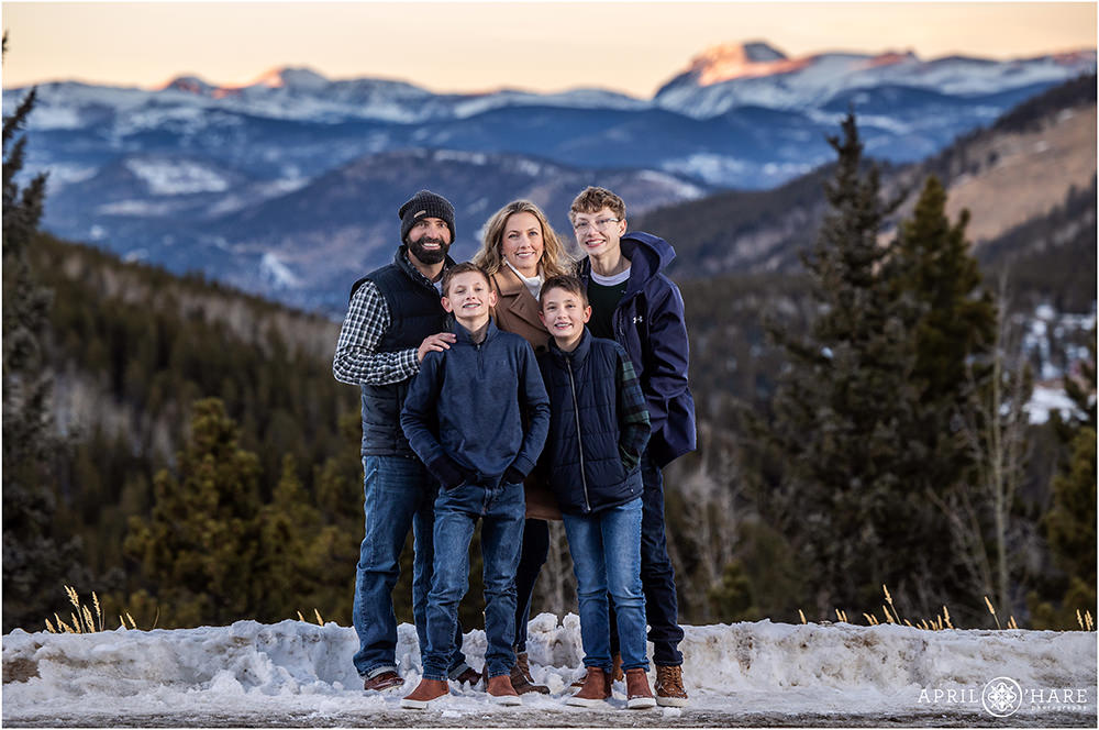Family portrait for a family of 5 with 3 sons with a gorgeous mountain backdrop in Evergreen Colorado
