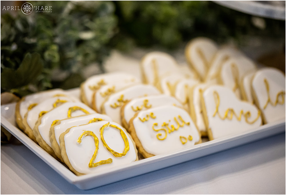 Detail photo of cute sugar cookies decorated for a 20th wedding anniversary vow renewal party in Colorado