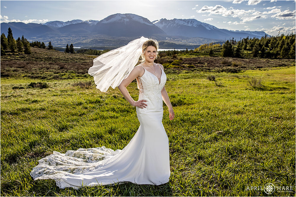Bright sunny Colorado wedding day portrait of a bride in Summit County Colorado