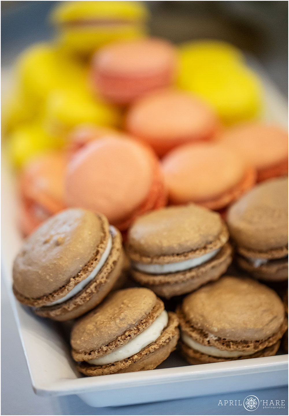 Detail photo from the dessert table with various flavored macarons