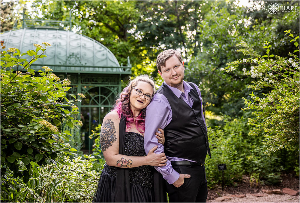 Engagement photo with the green iron solarium in the backdrop at Denver Botanic Gardens