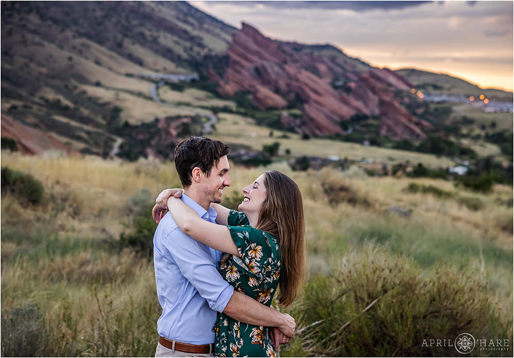 Romantic photo of a married couple embracing at East Mount Falcon Trailhead at sunset