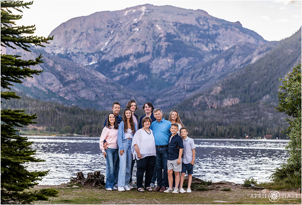 Extended family photo in front of a gorgeous blue mountain at Point Park in Grand Lake Colorado