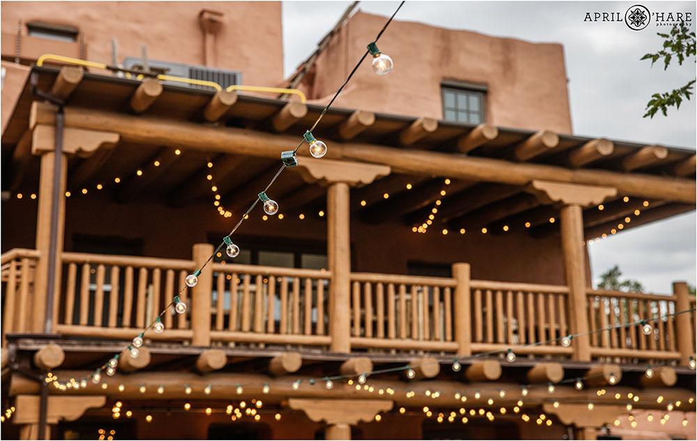 Red Rocks Trading Post Backyard wedding string lights hang overhead wedding receptions