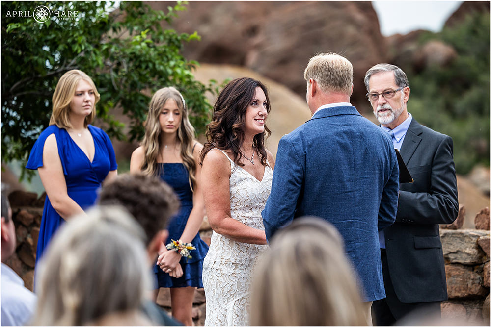 wedding vows outside at Red Rocks Trading Post in Colorado