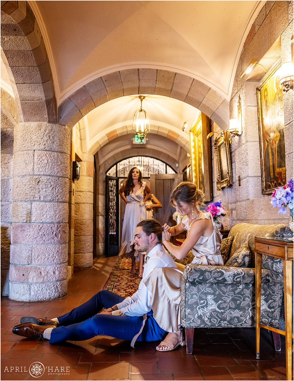 Wedding party gets ready inside a historic castle in Colorado