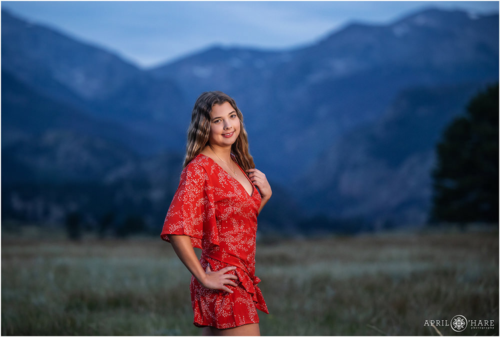 Beautiful senior portrait at dusk with a stunning mountain backdrop at Moraine Park