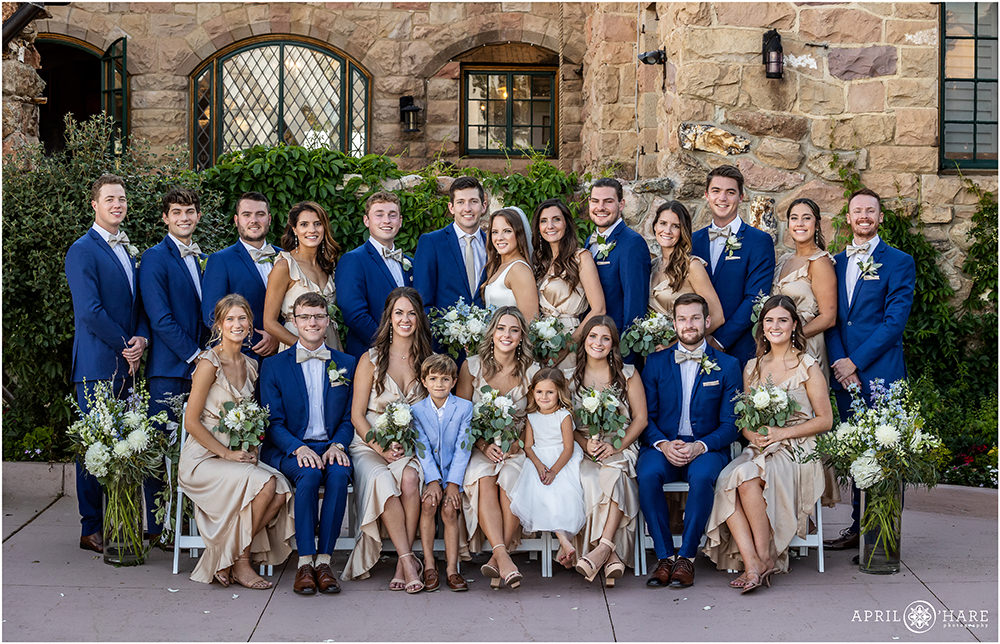 Large wedding party portrait at a castle wedding in Colorado