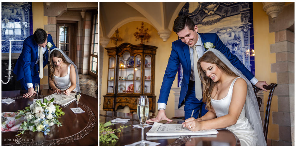 Bride and Groom sign their marriage license in the historic castle in Colorado