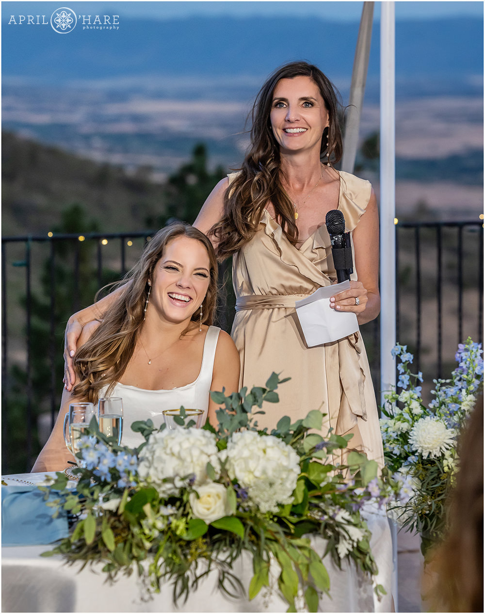 Bride and her sister during toasts at Cherokee Ranch and Castle in Colorado