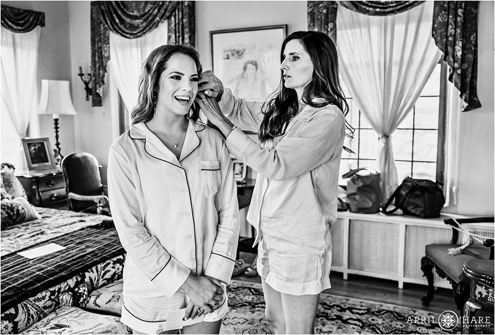 Bride and her sister get ready for her wedding day at historic Cherokee Ranch and Castle