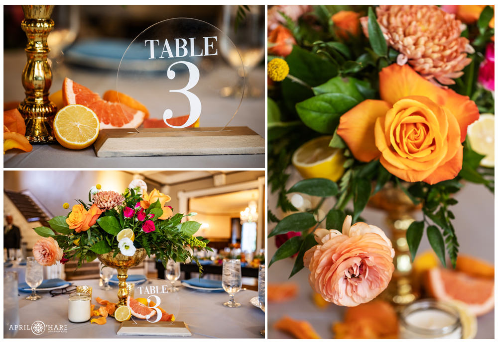 Beautiful table decor with citrus colored florals like orange and bright pink at Grant Humphreys Mansion in Denver