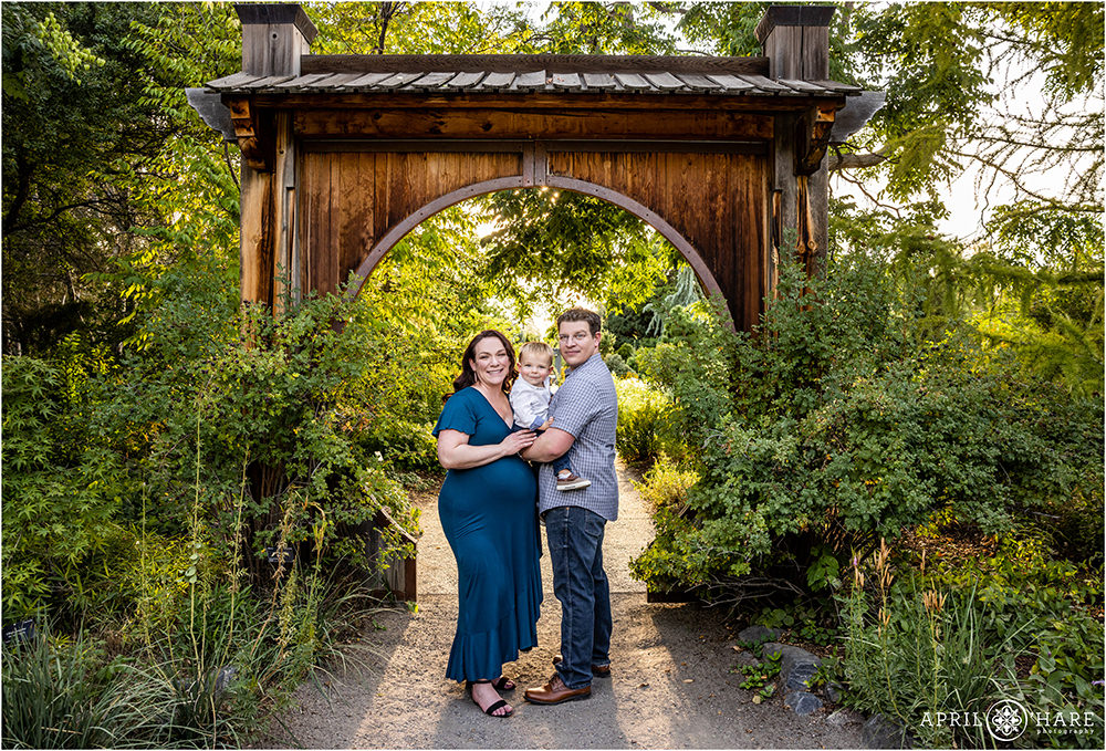 Gorgeous family photo at Denver Botanic Gardens in front of the circle gate
