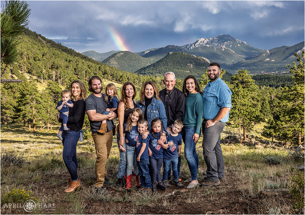 Extended family photo with a pretty rainbow mountain backdrop in Colorado