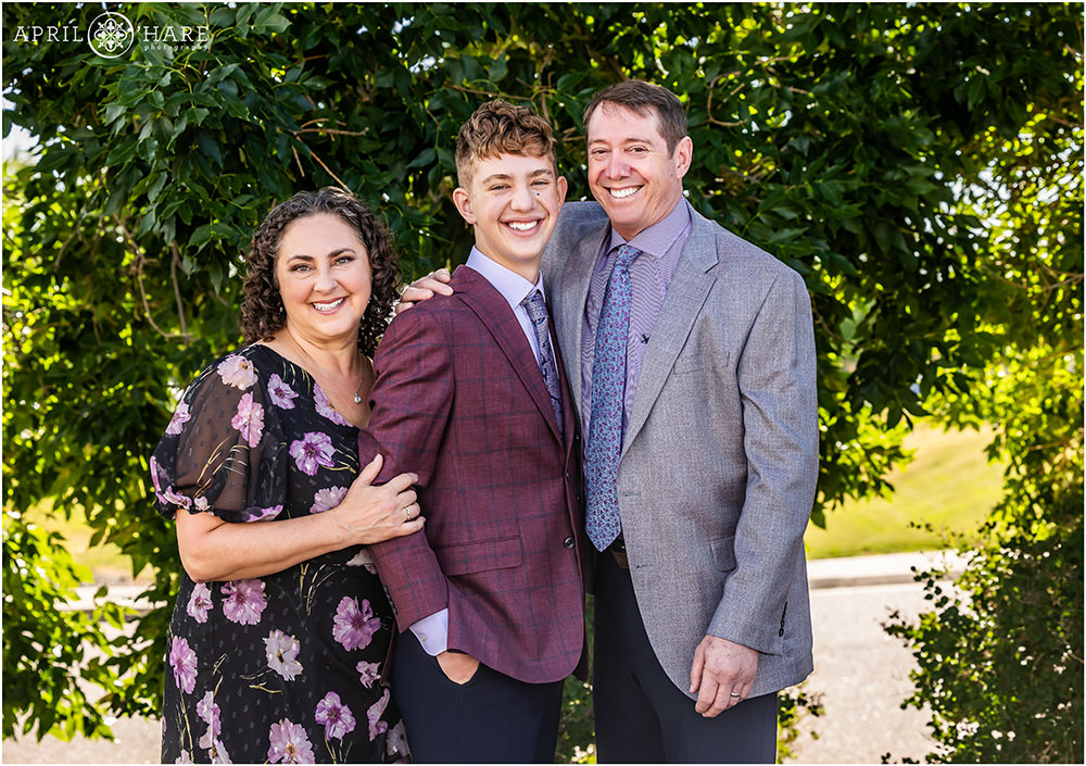 Parents with their son on the day of his bar mitzvah at B'Nai Chaim in Colorado