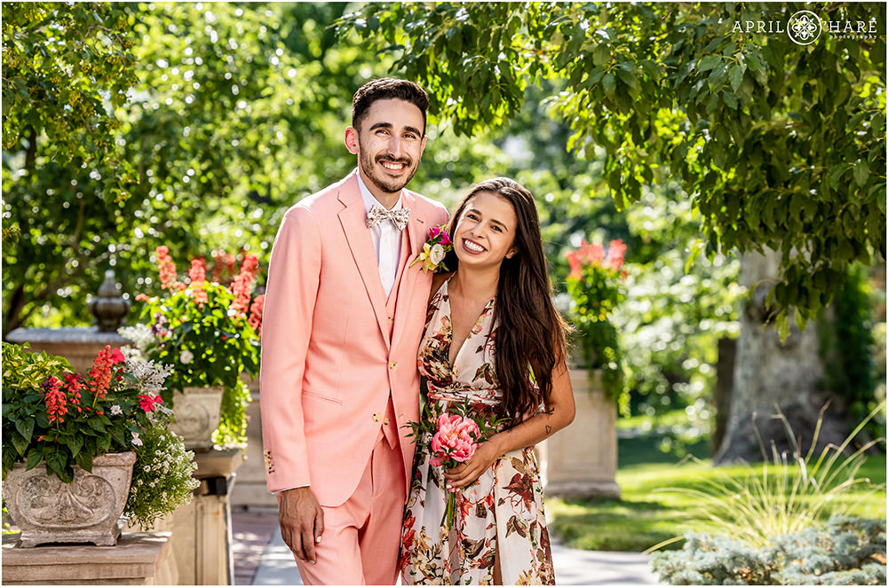Groom poses for a photo with his sister at Grant-Humphreys Mansion in Denver